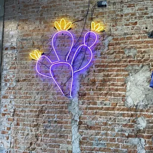 Love the neon sign details in here.