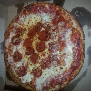 Half pepperoni? Not exactly. This was after I tried to slide some of it back where it was supposed to be, mind you.