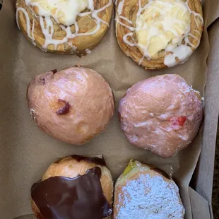 a variety of pastries in a box