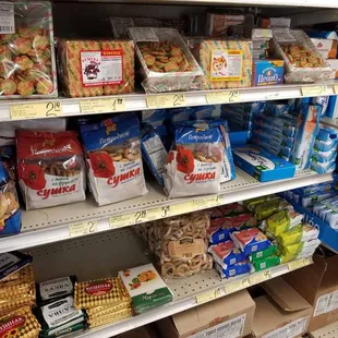 a variety of food items on a supermarket shelf