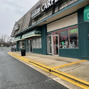 the front of a carpet express store