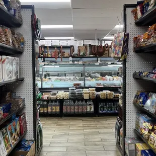 a grocery store with shelves of food