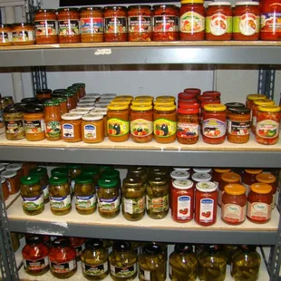 a shelf of jars and jars