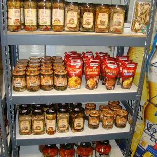 a shelf full of jars