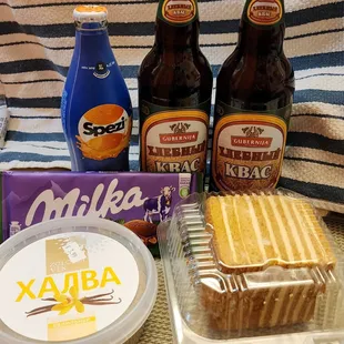 Ukrainian halvah, German milk chocolate/hazelnut bar, Lithuanian orange cola, B-H Kvass, and honey cake (2/13/23)