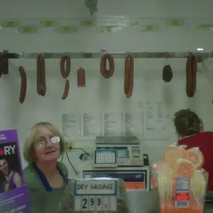 Choice of Homemade Smoke Kielbasa hanging behind the deli counter