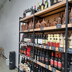 shelves of liquor and liquor bottles