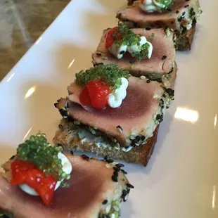 Seared Peppered Ahi Tuna with Wasabi Cream Cheese, Red Pimento &amp; Wasabi Caviar on a Multi-Grain Toast