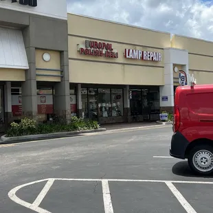 a red van in a parking lot