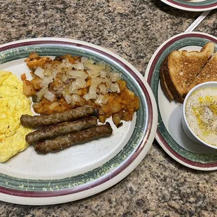 Home potatoes with onions and bell pepper. Eggs and sausage links with toast and grits.
