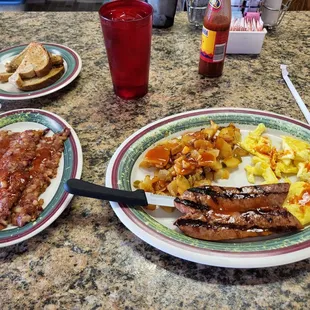 Whole bunch of food covered in hot sauce.