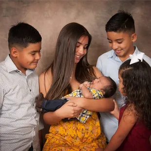 You are finally here! Brothers and sisters welcoming a new  member to the familly