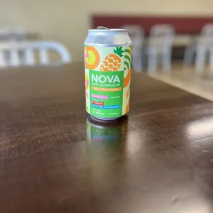 a can of novava on a table