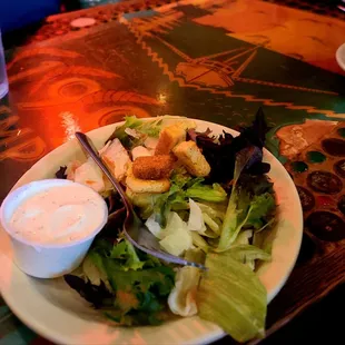 House salad. Dressing was amazing. My mama didn&apos;t even have to tell me to eat all my greens.