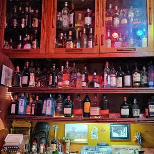 a bar with liquor bottles