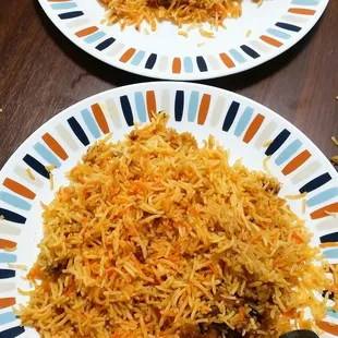 chicken biriyani .. huge portion ! divided 1 biriyani in 2 plates ..