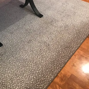 Customer&apos;s area rug for under the dining room table.
