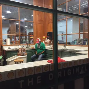 Lady at counter on cell phone, horrible