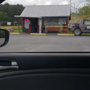The store! Inside you can find a variety of vegetables and some picked strawberries.
