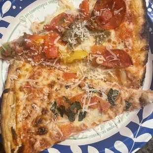 Top: Italian Sausage w Mixed Peppers Bottom slice: Margherita