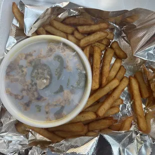 This is a chicken cheesesteak with extra meat and no bread.