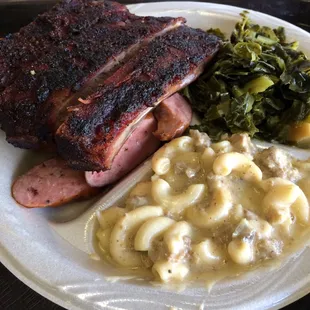 The 2 meat dinner (ribs and sausage).  Comes with 2 sides - I had collard greens and the Mac &amp; beef.  Amazing flavor!!