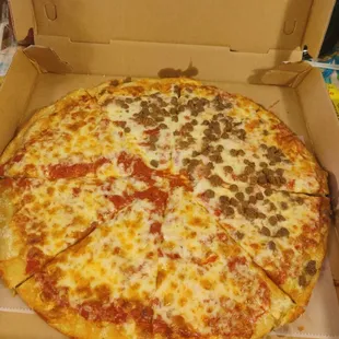 Half cheese half ground beef pizza. Not worth the Price