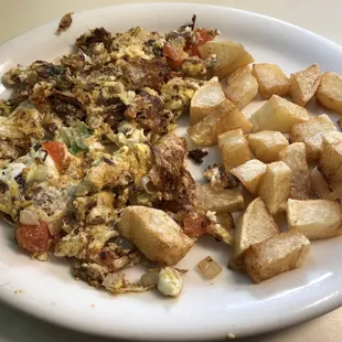 Machacado com Huevo A la Mexicana comes with potatoes and beans (I didn't want refried beans and they don't serve whole charro beans)