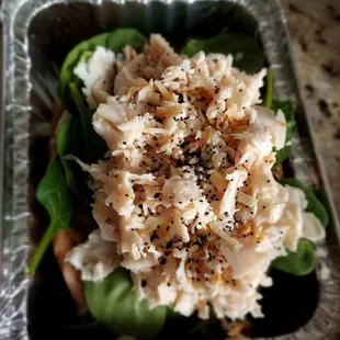 a salad in a plastic container