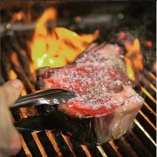 40-day Dry Aged Rib Eye on our wood fired grill