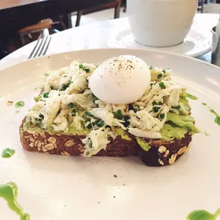 Multigrain toast, avocado, Dungeness crab, poached egg ($18)
