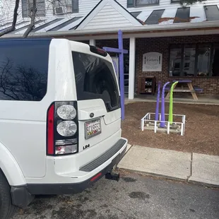 a white van parked in front of a house