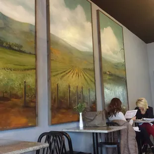 two women sitting at a table