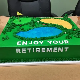 a cake with a golf course on it