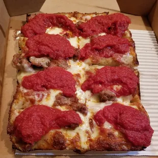Single Detroit with pepperoni and sausage.