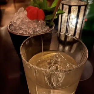 a glass of lemonade and ice