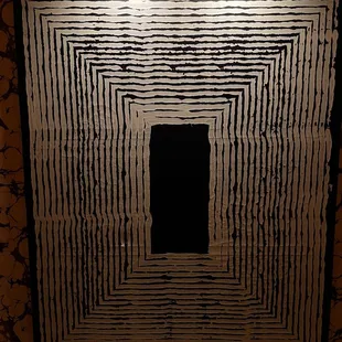 a black and white picture of a mirror