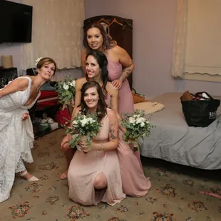 Bride and bridesmaids getting ready