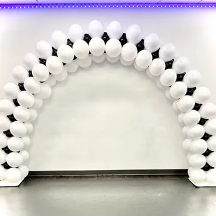White and black balloon arch