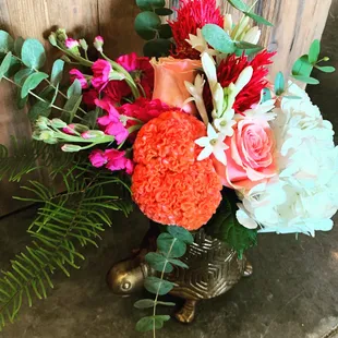 Tucked into a lovely brass turtle