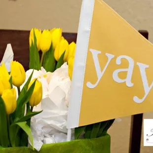 Yellow tuilp bridesmaid bouquets.