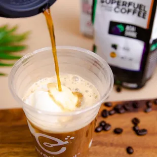 coffee being poured into a cup