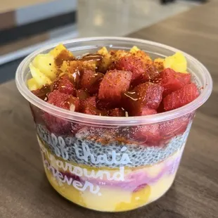 Mango Tajín bowl with mango and dragonfruit sorbet, watermelon, pineapple, chia seeds, and Tajín.