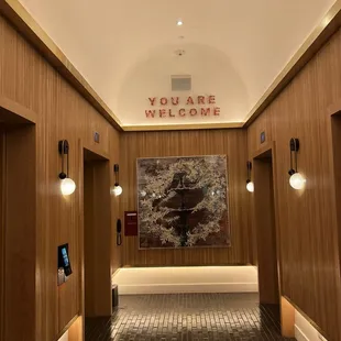 a hallway leading to an elevator