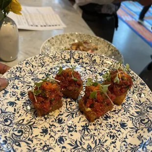 Prime beef Steak tartare  Chrissy soft shelled crab burrta