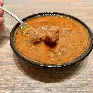 Lamb Curry. Cuts are beautifully tender, but a few were a little on the dry side. Their deeply flavorful curry sauce is spicy.