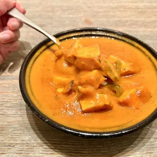 Chicken Tikka Masala. Chicken is slightly firm, but still very good. The masala sauce has a sweet and earthy flavor with layers of spicing.