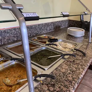 2. Vegetable Korma 4. Saag Paneer 6. Samosas 7. Veggie Pakoras 1. Chicken Tikka Masala