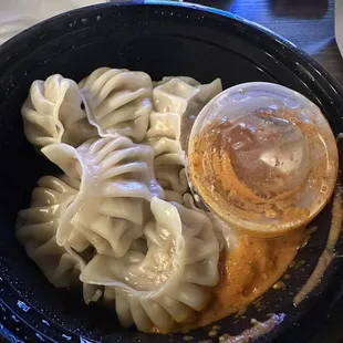 Steamed dumplings with SPICY sauce