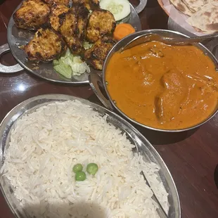 Butter chicken &amp; Chicken Tikka with a side of rice